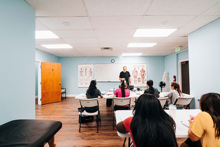 Glen, our instructor, answering student questions about in-class material
